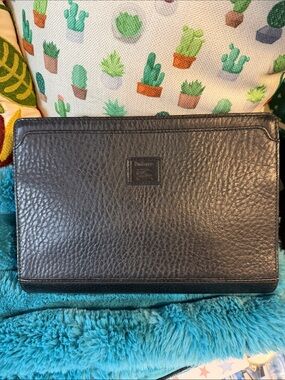 Burberry’s Wristlet or Planner